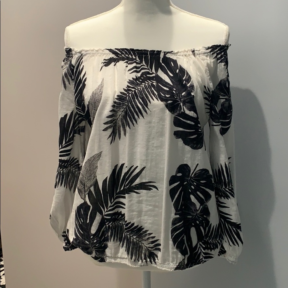 Old Navy white with tropical black leaves.